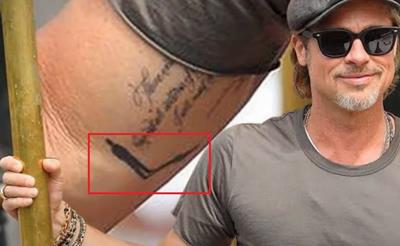 A Guide To 10 Brad Pitt Tattoos and What They Mean